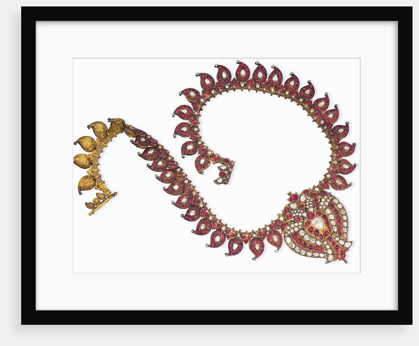 An Indian ruby and diamond necklace with a centre-piece designed as a double-peacock and set with table-cut diamonds and ruby cabochons throughout by Anonymous