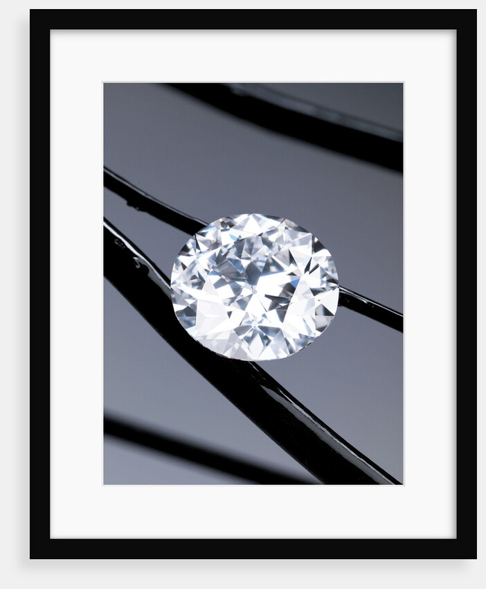An unmounted circular-cut diamond weighing 50 carats by Anonymous