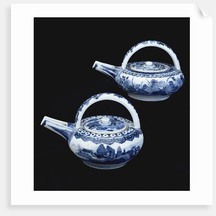 Two blue and white Arita ewers and covers by Anonymous