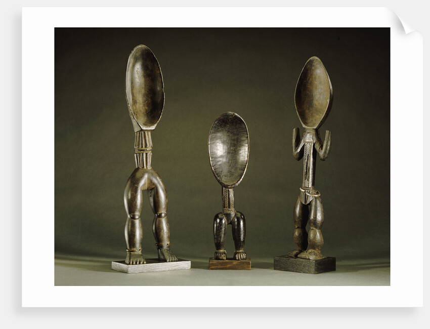 Three Dan spoons with elogated legs by Anonymous