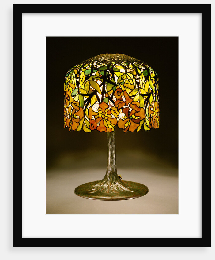 Tiffany Studios 'Trumpet Creeper' leaded glass and bronze table lamp by Anonymous