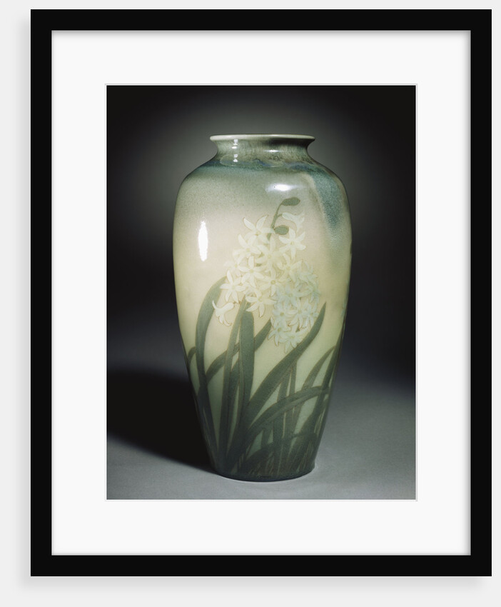 An earthenware vase depicting hyacinths and leafage in shades of ivory and green by Anonymous