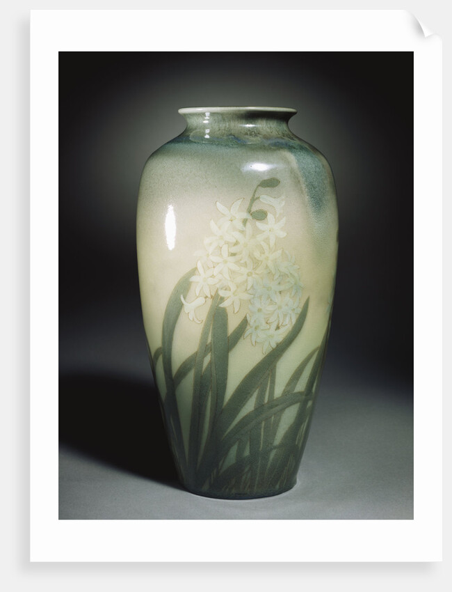 An earthenware vase depicting hyacinths and leafage in shades of ivory and green by Anonymous