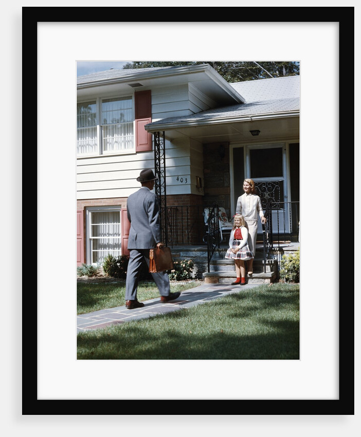 1950s Mother Daughter Waiting Steps House For Father Briefcase Coming Home Suburban Family Man Woman Girl Retro by Anonymous