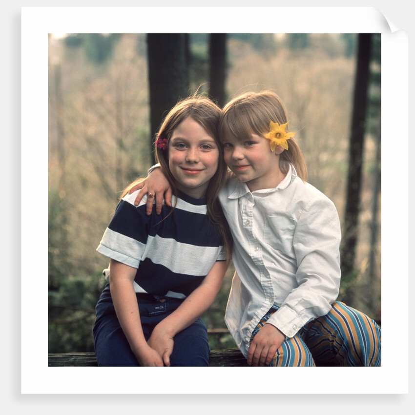 two Young Girls With Flowers In Their Hair Sitting Outside Retro 1970 1970s by Anonymous