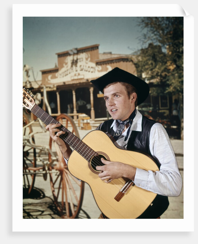 1960s Man Singing Cowboy Strumming Playing Acoustic Guitar by Anonymous