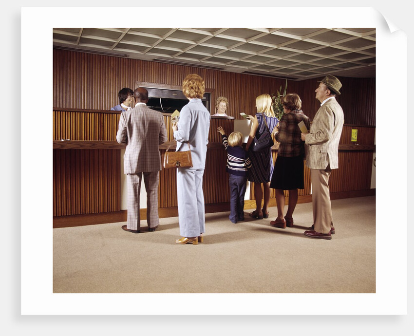 1970s Men Women Children Waiting In A Line In Bank For A Teller by Anonymous
