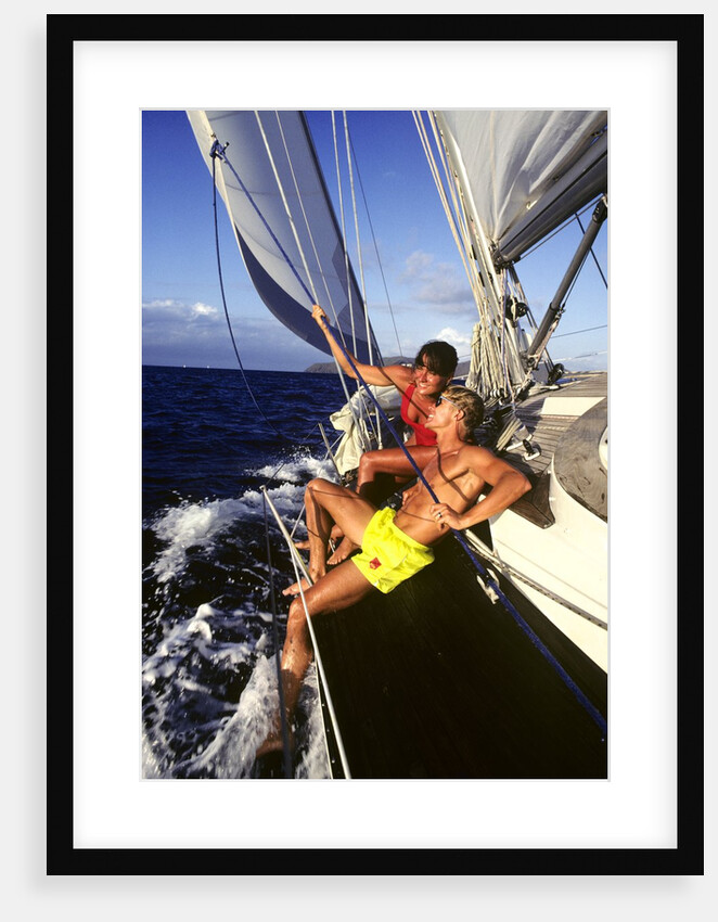 couple Enjoying The Ride On Deck Of Sailboat Heading Toward St. Vincent West Indies by Anonymous