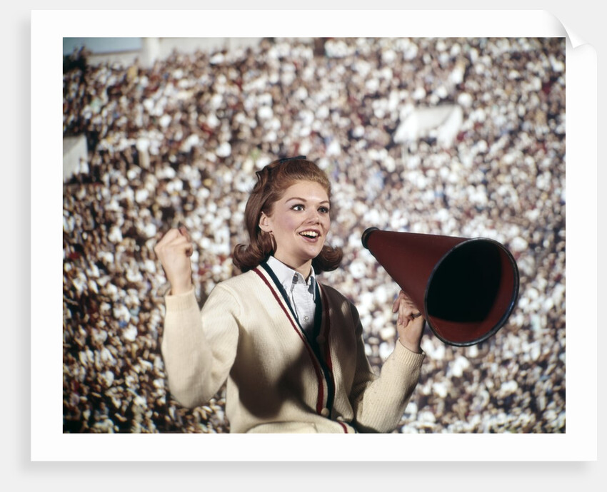 1960s Female Cheerleader Cheering Red Megaphone Wearing Sweater by Anonymous