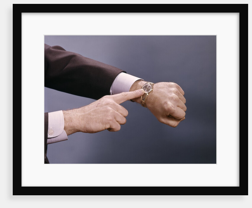 1960s Man Hand Pointing At Wrist Watch Time by Anonymous