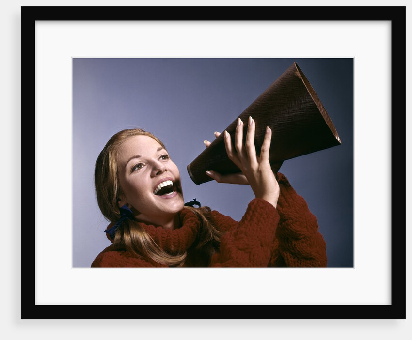 1960s Portrait Teen Cheerleader Girl Shouting Into Megaphone by Anonymous