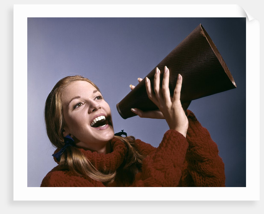 1960s Portrait Teen Cheerleader Girl Shouting Into Megaphone by Anonymous