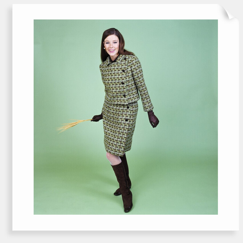 1960s Young Woman Modeling Green Wool Knit Two Piece Suit Fishnet Stockings Boots Full Length Clothes Retro by Anonymous