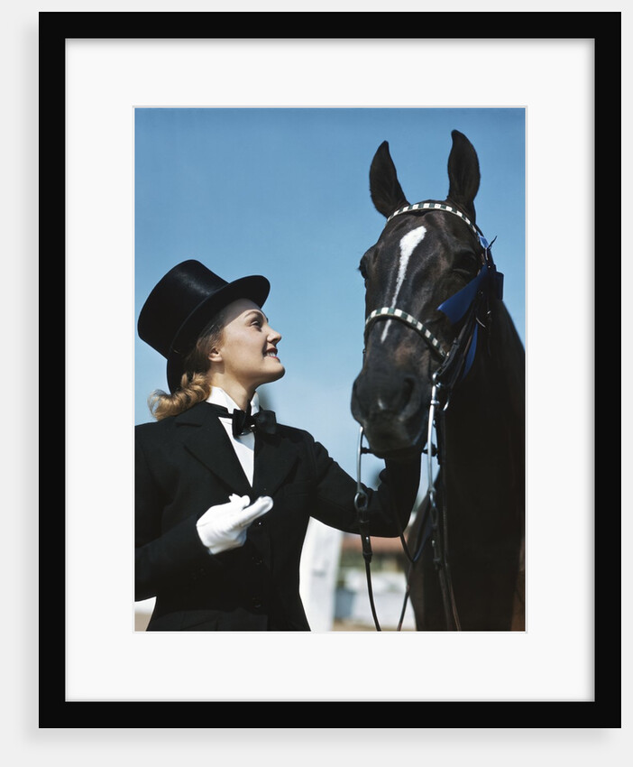 1940s 1950s Smiling Woman Wearing Top Hat Tuxedo White Gloves Holding Riding Crop Posing With Horse Blue Ribbon Winner by Anonymous