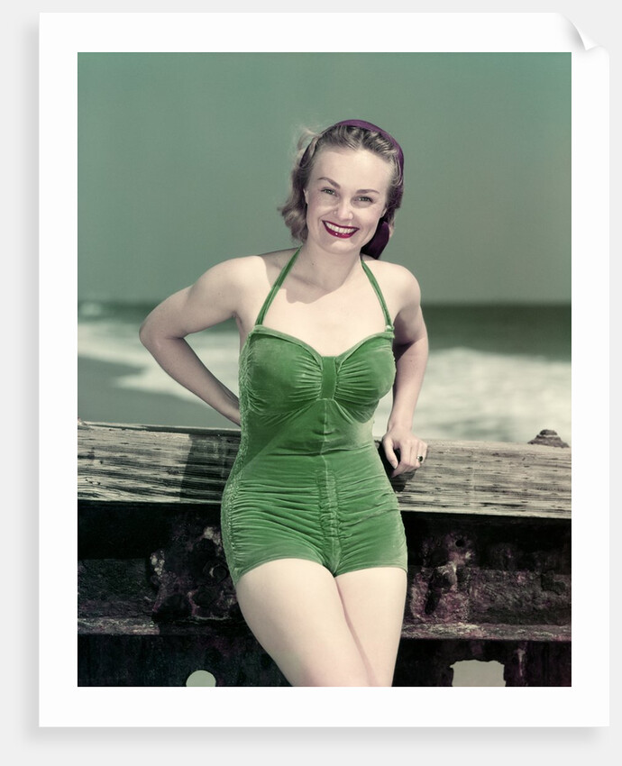 1940s Portrait Smiling Woman Wearing Green Velvet Bathing Suit Posing Leaning On Diving Board by Anonymous