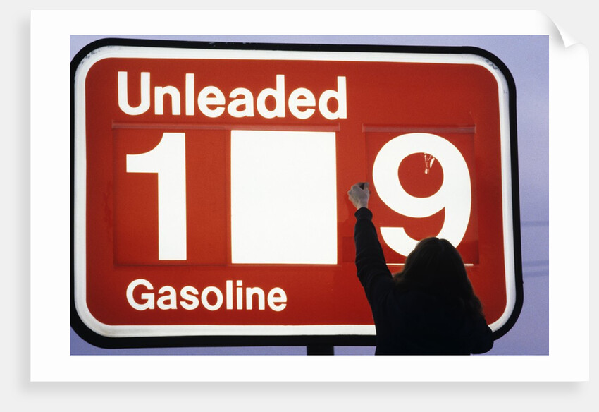 1980s Anonymous Unidentified Person Changing Gasoline Prices Sign by Anonymous