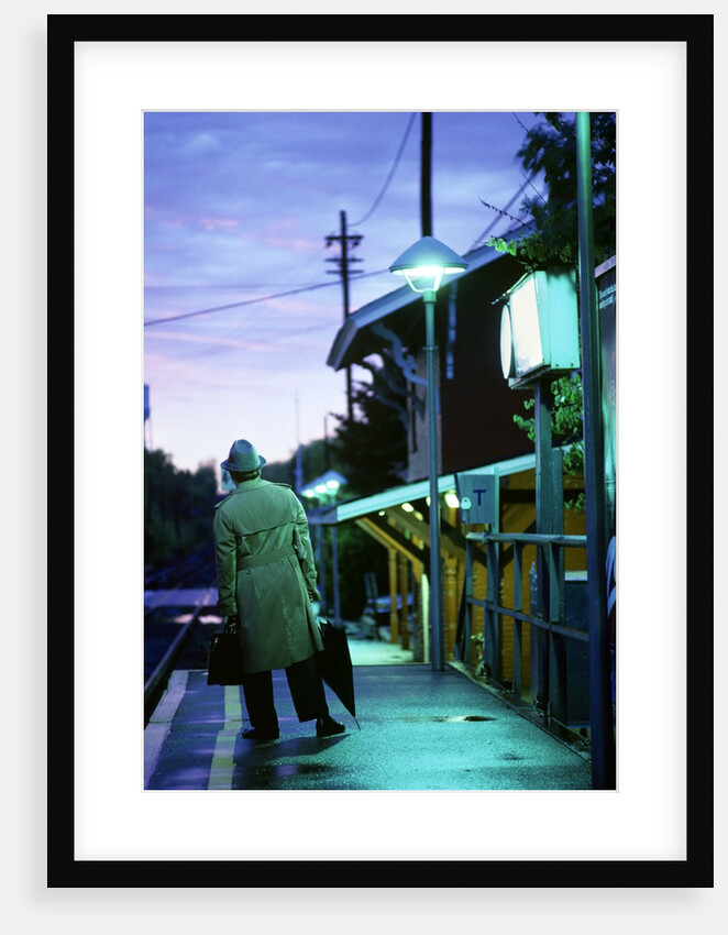 1970s 1980s Impatient Anonymous Man Waiting For Commuter Train by Anonymous