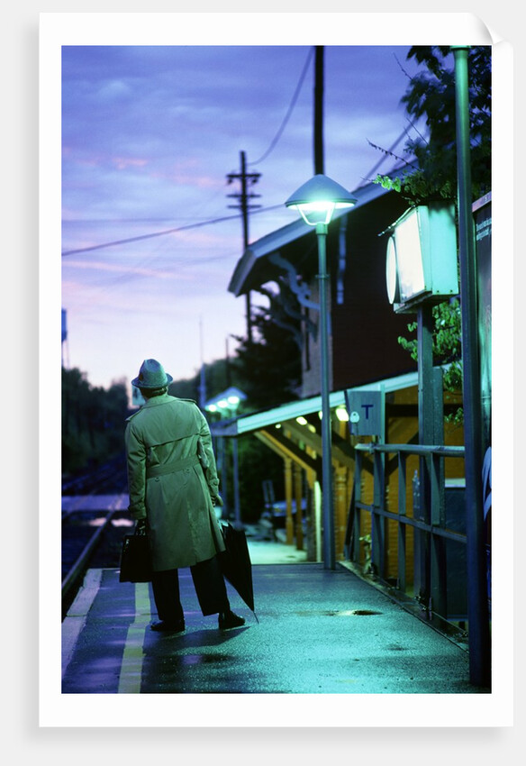 1970s 1980s Impatient Anonymous Man Waiting For Commuter Train by Anonymous
