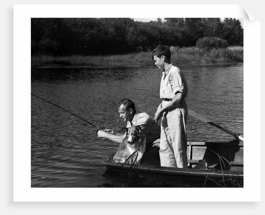 1930s Man Father Teenage Boy Son Dog In Row Boat Fishing In Pond by Anonymous