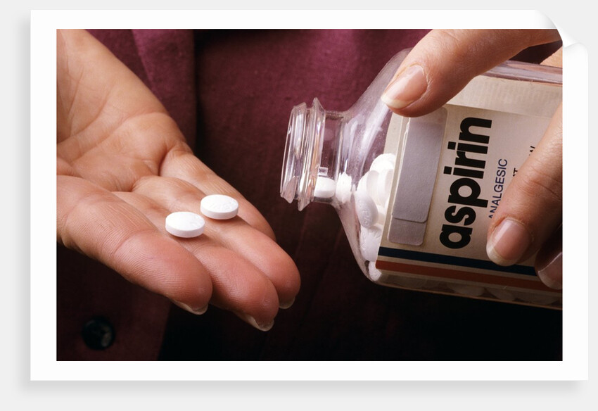 1990s Female Hand Taking Two Aspirin Tablets From Bottle by Anonymous