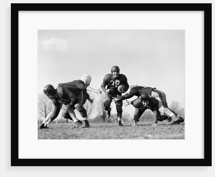 1940s 1950s Five Young Men Wearing Leather Helmets And Uniforms Playing Football by Anonymous