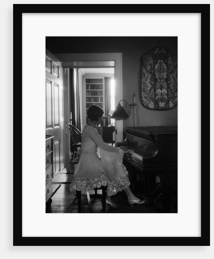1920s Woman Pianist Sitting Playing Piano by Anonymous