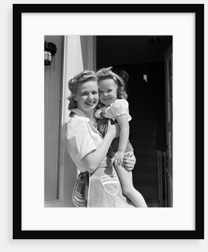 1940s Portrait Woman Mother Holding Girl Daughter Smiling Looking At Camera by Anonymous