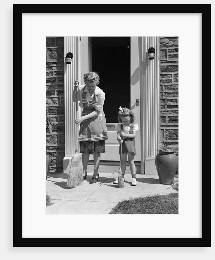 1940s Mother And Daughter Sweeping Sidewalk In Front Of Home by Anonymous