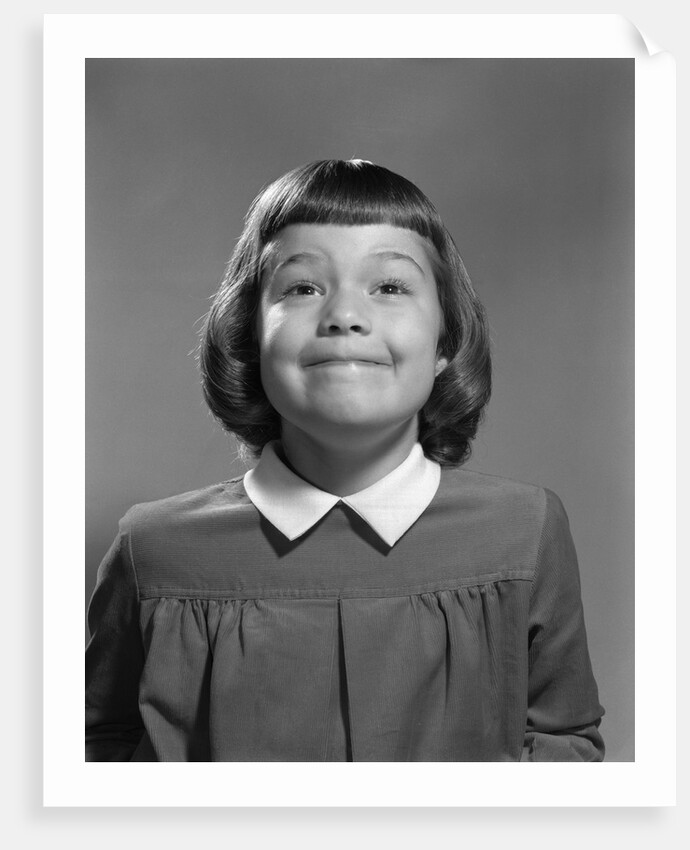1950s Girl Page Boy Hair Bangs Smiling Funny Facial Expression Looking At Camera by Anonymous