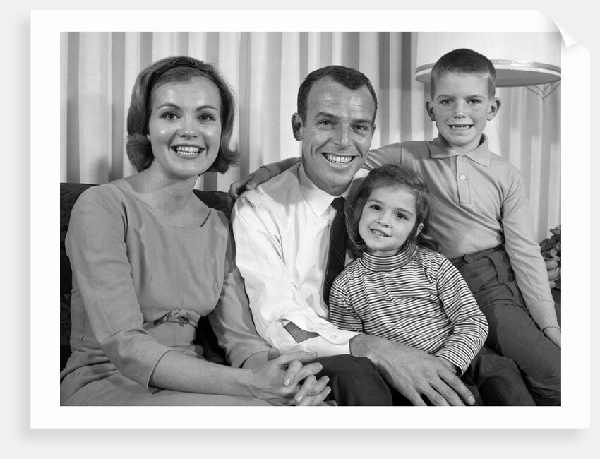 1960s Smiling Family Portrait Mother Father Son Daughter Looking At Camera by Anonymous