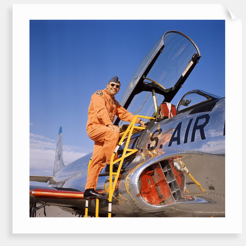 1960s 1970s Smiling Military Pilot Ladder Climbing Enter Cockpit Looking At Camera by Anonymous