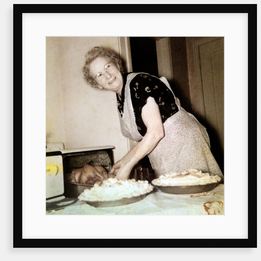 Grandma cooks in the kitchen, ca. 1952 by Anonymous