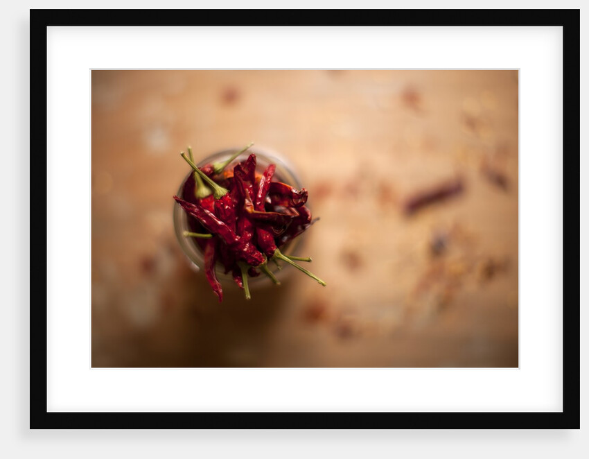 Dried red chillies in a mason jar by Anonymous