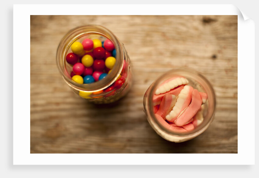 Bubble gum balls and teeth candy in mason jars by Anonymous