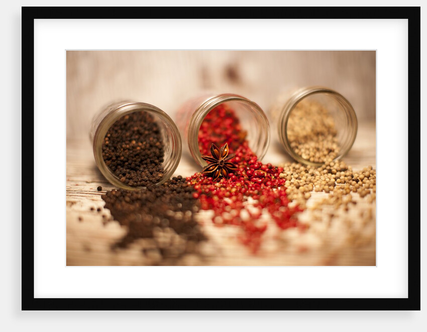 Black, red, and white pepper corns in rustic mason jars by Anonymous