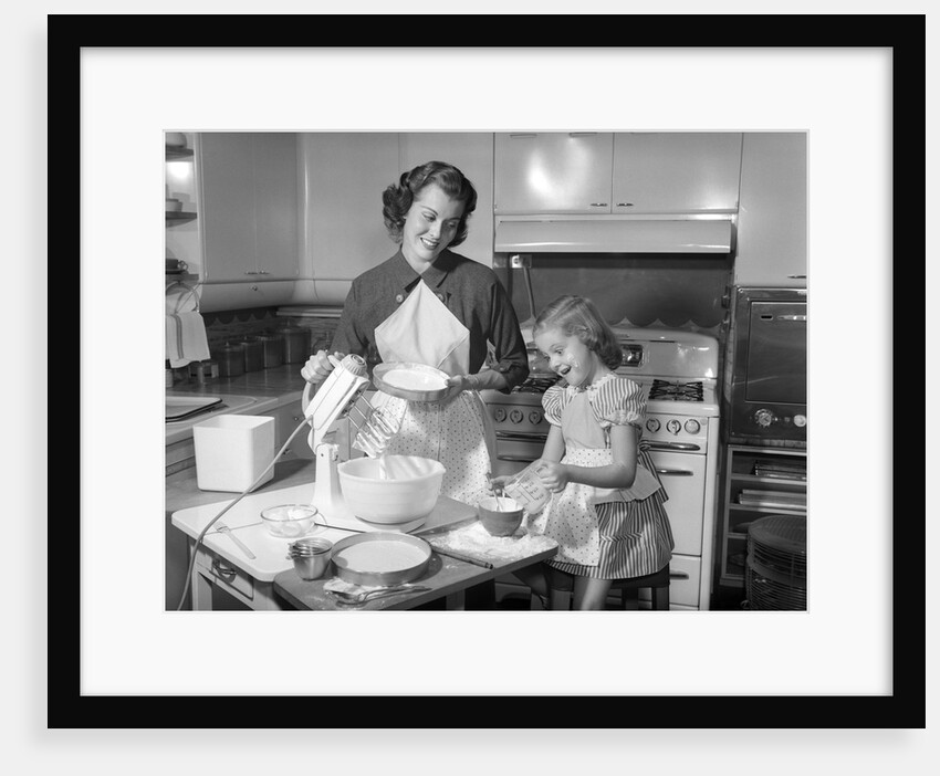 1950s mother and daughter baking a cake by Anonymous