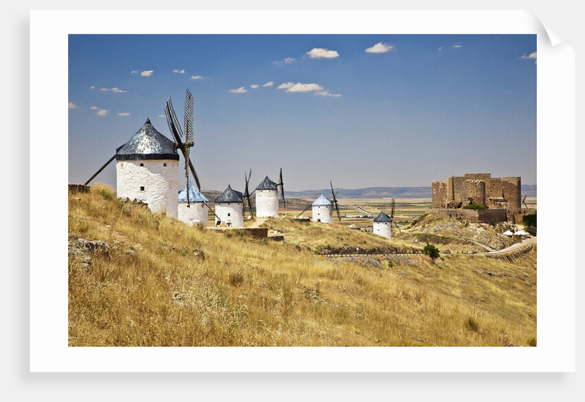 Antique La Mancha windmills and castle in Consuegra, Spain by Anonymous