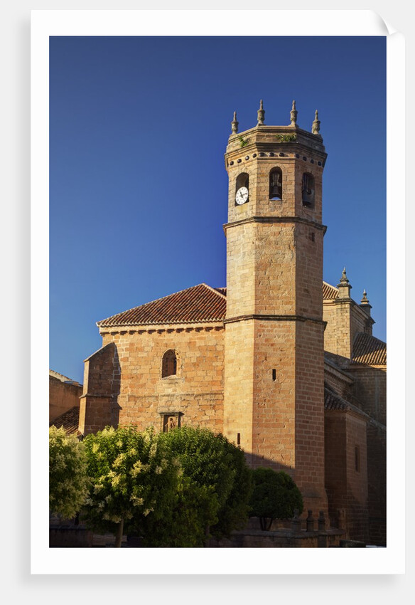 Clock tower of the San Mateo Church in Banos de la Encina, Spain by Anonymous