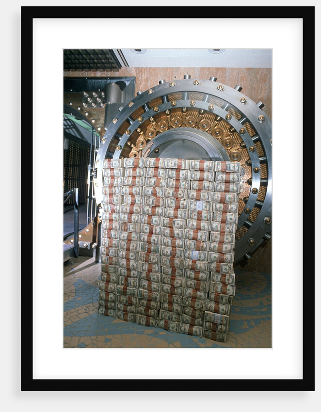 Money stacked by bank vault by Anonymous
