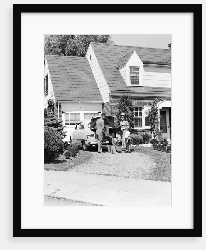 1940s 1950s family in front of suburban house by Anonymous