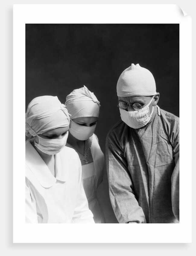 1920s 1930s doctor and two nurses wearing surgical masks by Anonymous