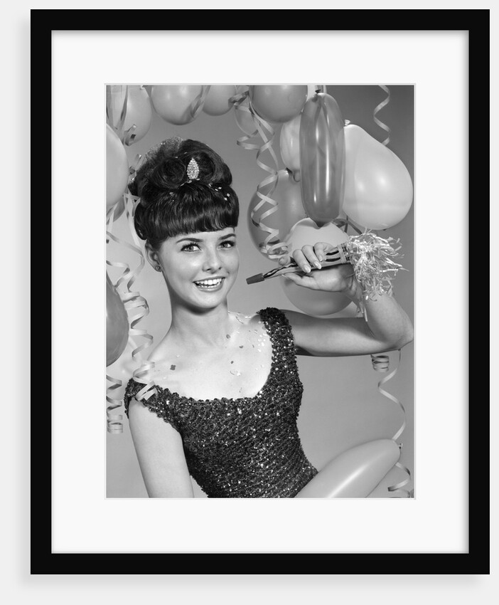 1960s smiling young woman at New Year party by Anonymous