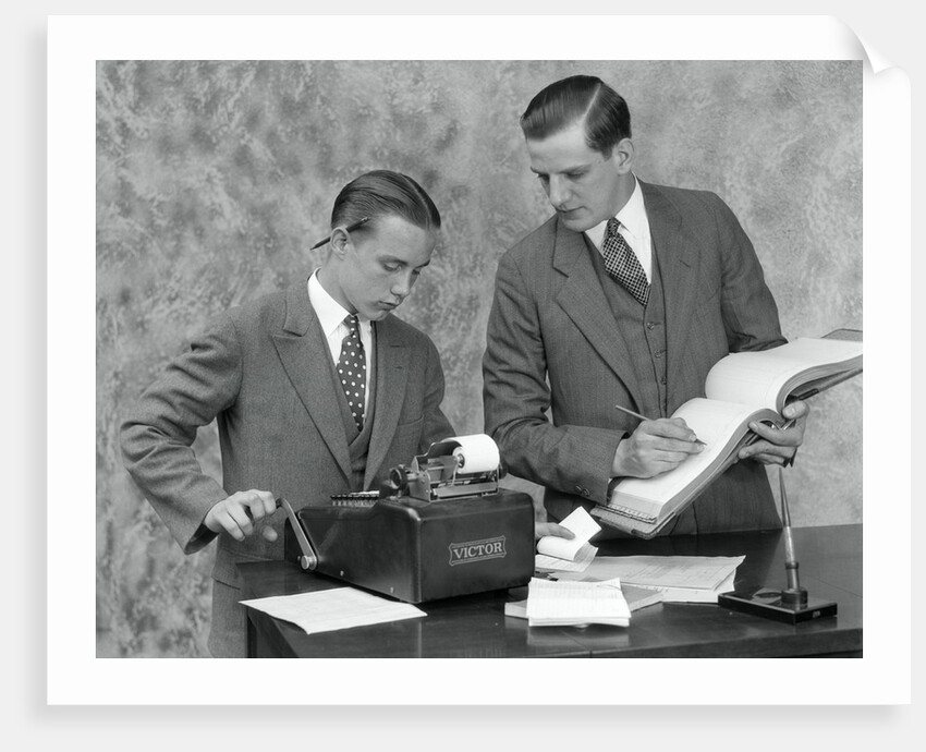 1920s bookkeeper and young assistant by Anonymous