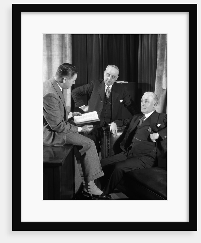 1930s businessmen having a discussion by Anonymous