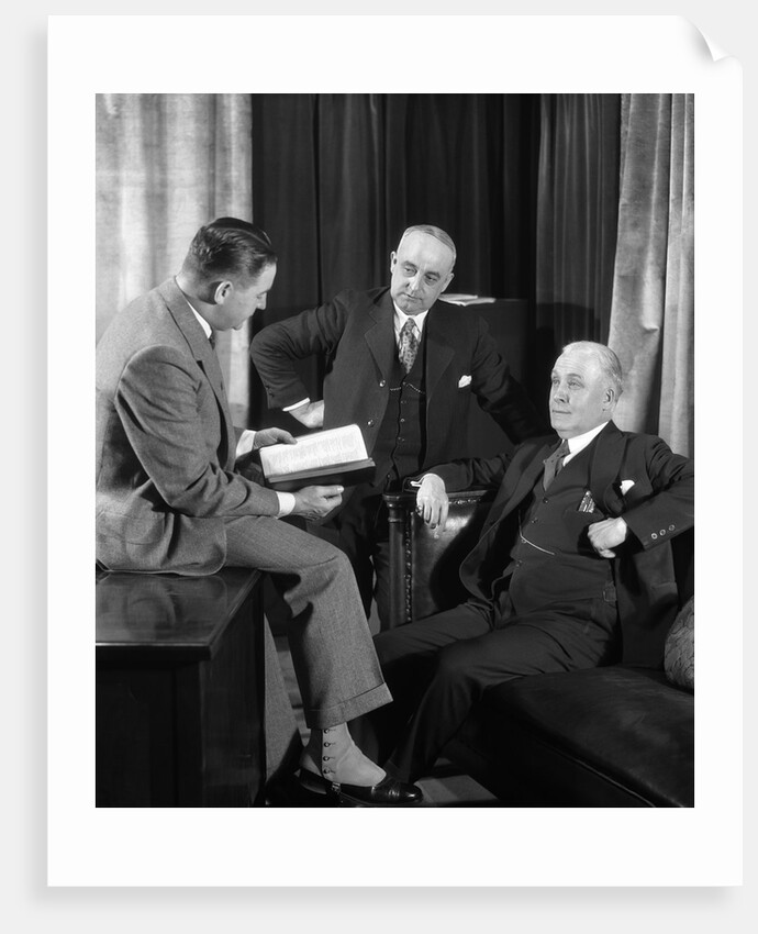 1930s businessmen having a discussion by Anonymous
