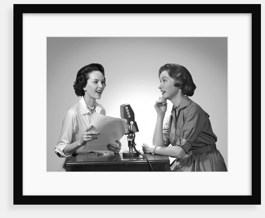 1950s two women doing a radio broadcast by Anonymous