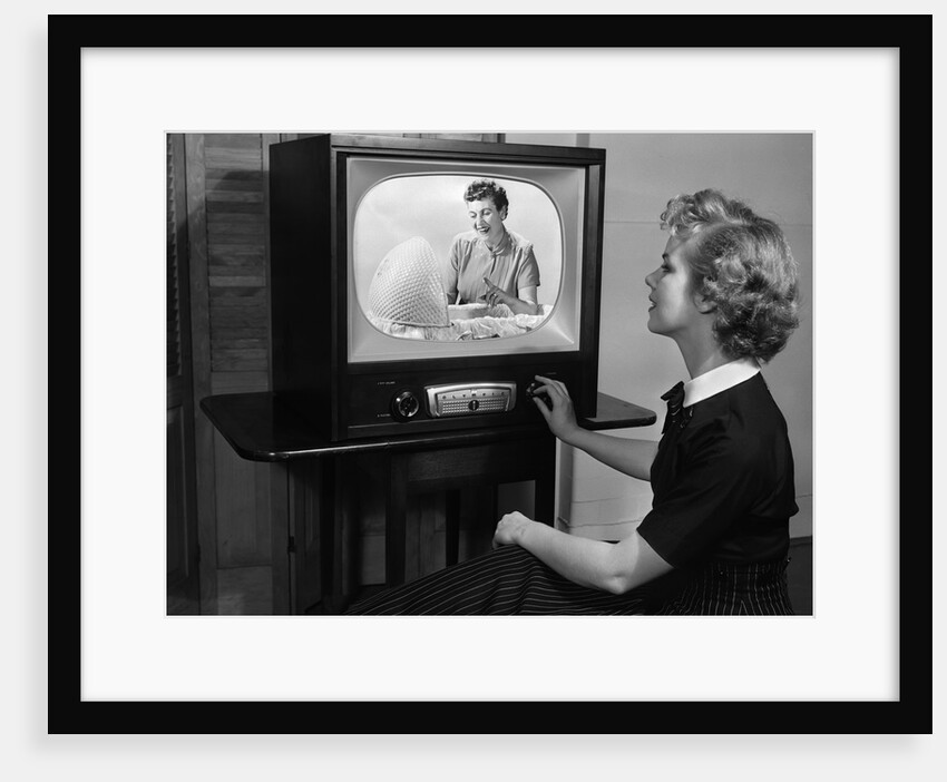 1950s woman watching tv program about child care by Anonymous