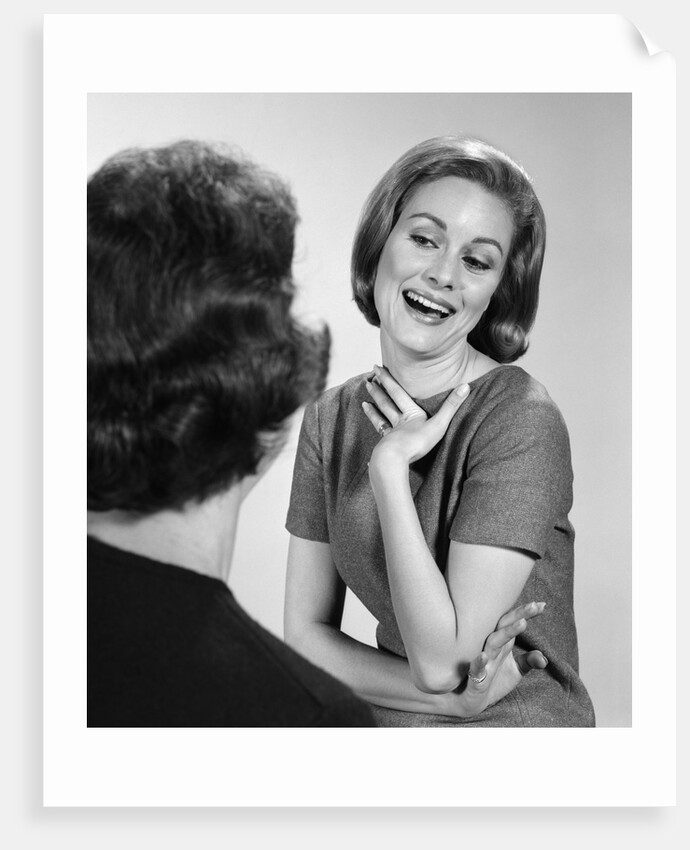 1960s two women talking by Anonymous