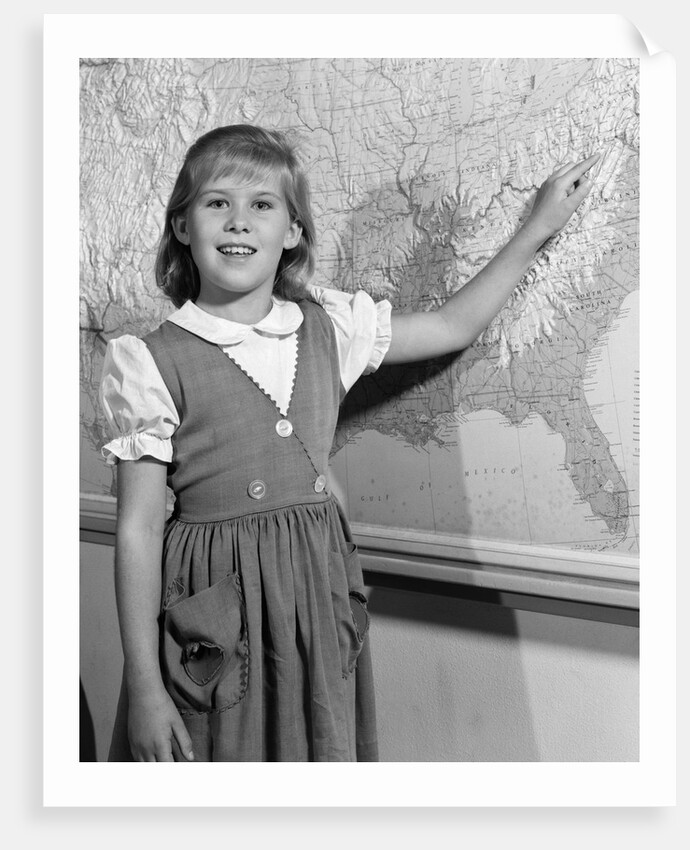 1960s school girl pointing to map of the USA by Anonymous