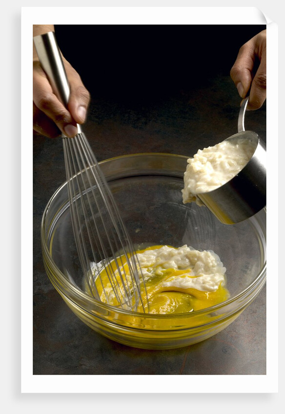 Adding hot rice to egg yolks by Anonymous